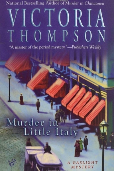 Murder in Little Italy by Victoria Thompson book cover shows people milling about on a street in LIttle Italy, New York City in the early 1900s.