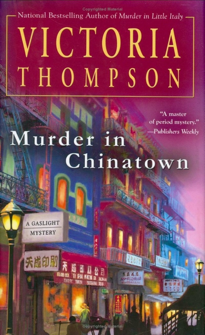 Murder in Chinatown by Victoria Thompson book cover shows a street in Chinatown in New York City at dusk in the early 1900s. The sky is pink, and a gas street lamp is lit in the foreground.