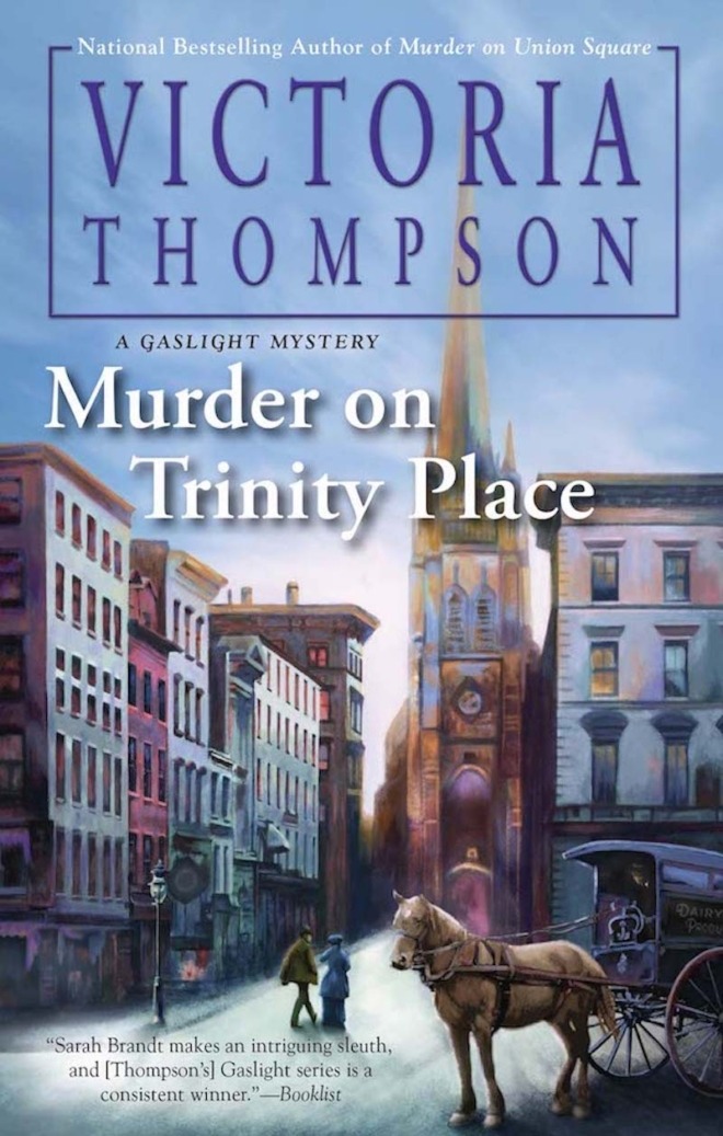 Murder on Trinity place by Victoria Thompson book cover shows a narrow, early 1900's New York City street at dusk The sky is dark blue. A large church can be seen. A horse and carriage and a man and woman pass by.
