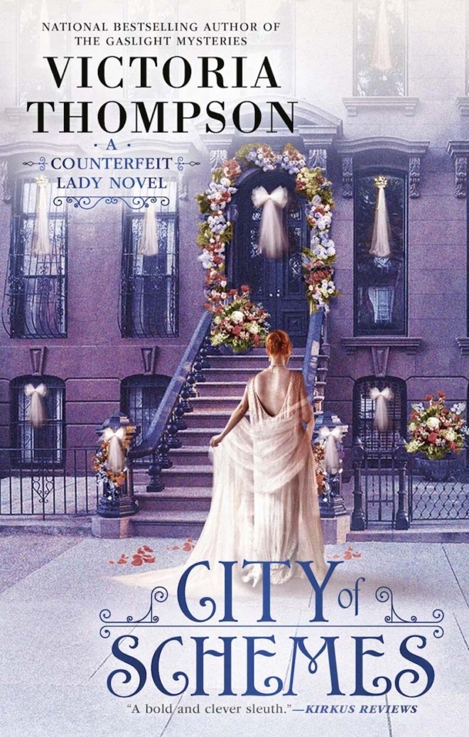 City of Schemes by Victoria Thompson Book Cover shows a white woman with red hair in a flowing, white, backless gown about to go up the stairs to a New York City brownstone that is decorated for Christmas.